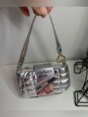 Radiant Glow Silver Quilted Mini Wristlet